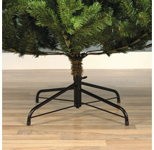 Detailaufnahme eines künstlichen Weihnachtsbaums mit Metallständer.