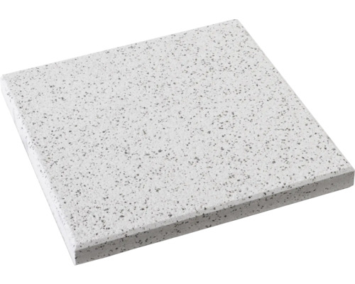 Quadratische Fliese mit gesprenkelter Oberfläche.