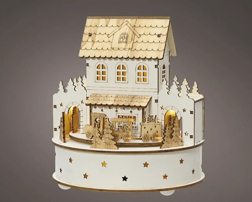 Dekorative Holzhütte mit Zug und Beleuchtung für die Weihnachtszeit
