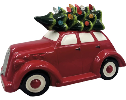 Dekorative rote Auto Figur mit Weihnachtsbaum auf dem Dach.