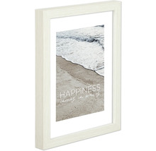 Bilderrahmen mit Strandmotiv und dem Spruch ''Happiness comes in waves''.