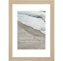 Gerahmtes Bild mit Strandmotiv und dem Schriftzug Happiness comes in waves