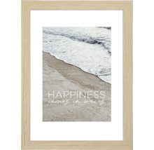 Gerahmtes Strandbild mit dem Schriftzug Happiness comes in waves