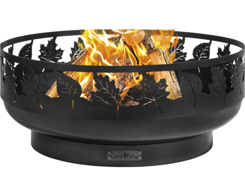 Feuerschale aus Metall mit Blätterdesign und brennendem Holz