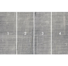 Nahaufnahme von vier Betonplatten mit unterschiedlichen Oberflächenstrukturen