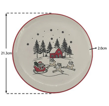 Weißer Weihnachtsteller mit rotem Rand, Durchmesser 21,3 Zentimeter, Höhe 2,0 Zentimeter, Motiv Weihnachtsmann im Schlitten, Rentiere und Haus.