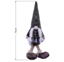 Weihnachtswichtel Mädchen mit Zöpfen, Rock und spitzem Hut, Höhe 74 Zentimeter.